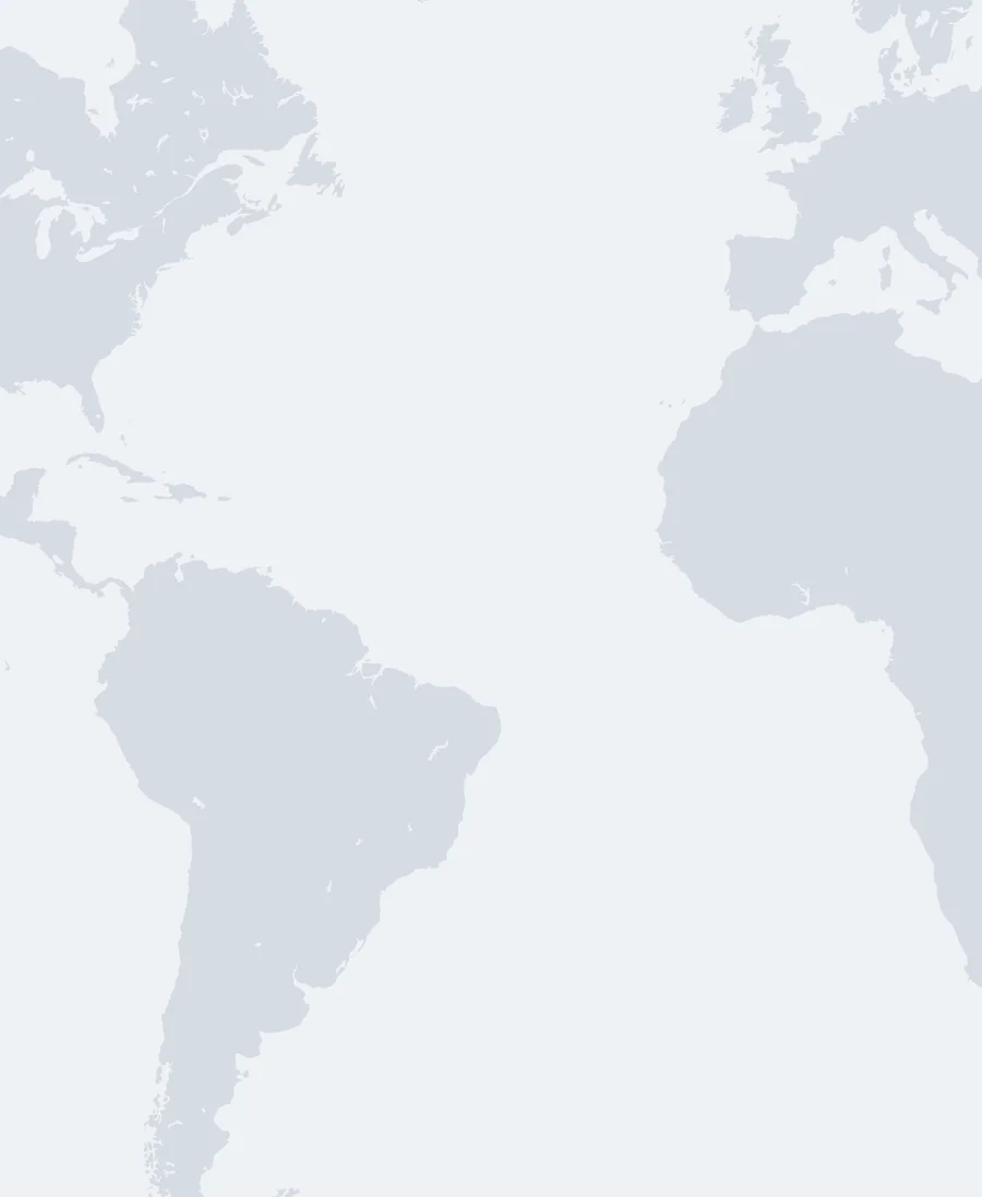 The Alumnia people map: alumni grouped by city across the Americas and Europe, Madrid's card open with an upcoming event, and the card of an alum who offers mentoring